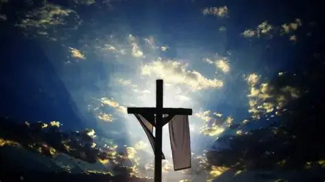 Symbolism of Easter represented by an illuminated cross against a serene sky, embodying themes of renewal and hope.