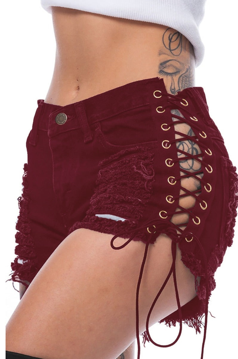 Explosion hole denim shorts side eye bandage hot pants