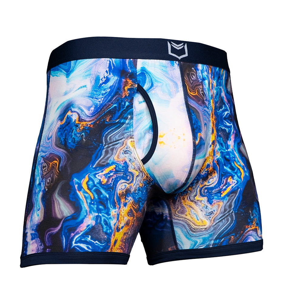 Men's pouch underwear in a vibrant blue and orange marble design, showcasing SHEATH 4.0 Bamboo Elements Boxer Brief.