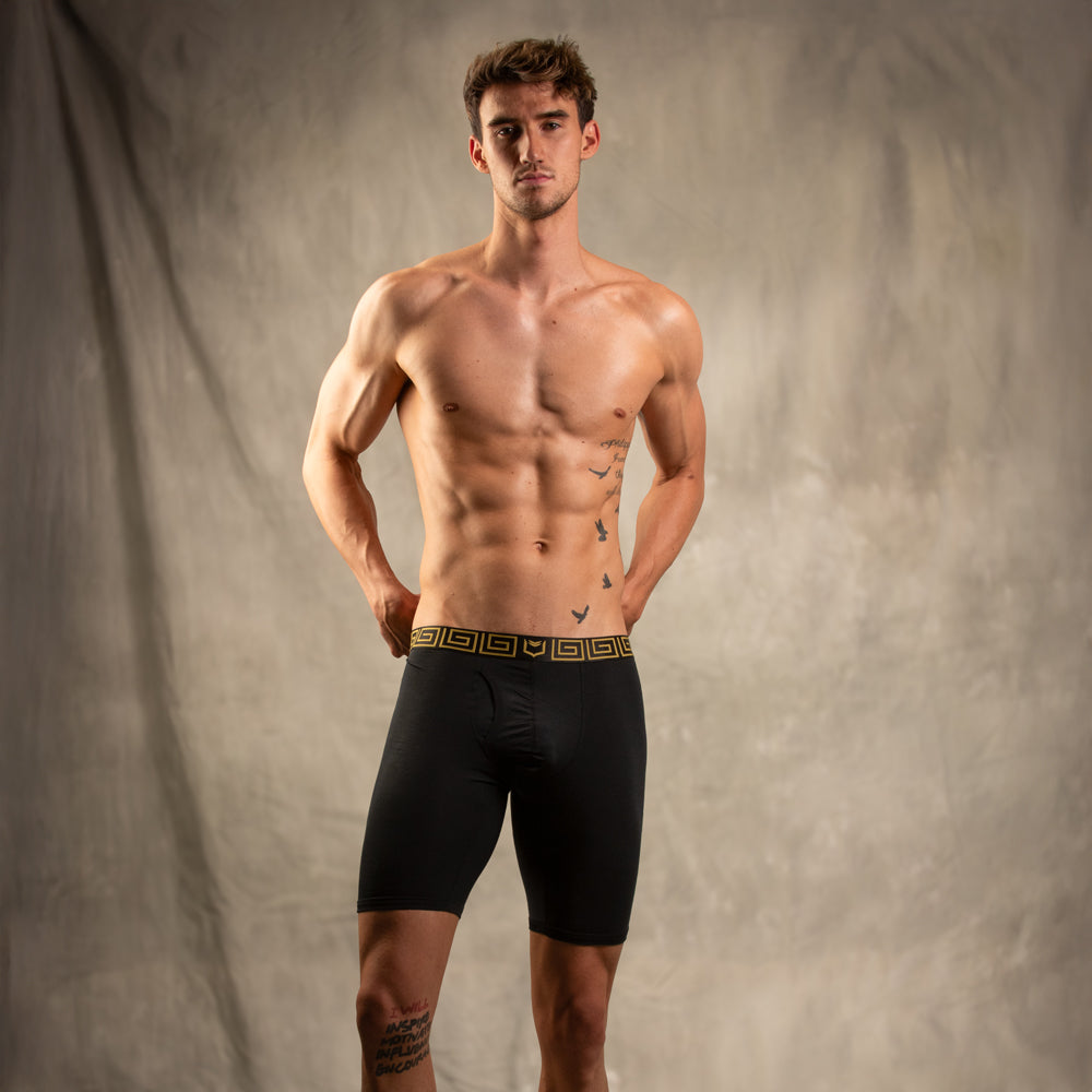 Pouch Boxer Briefs for Men model wearing SHEATH V Modal 8" boxer briefs showcasing comfort and style.