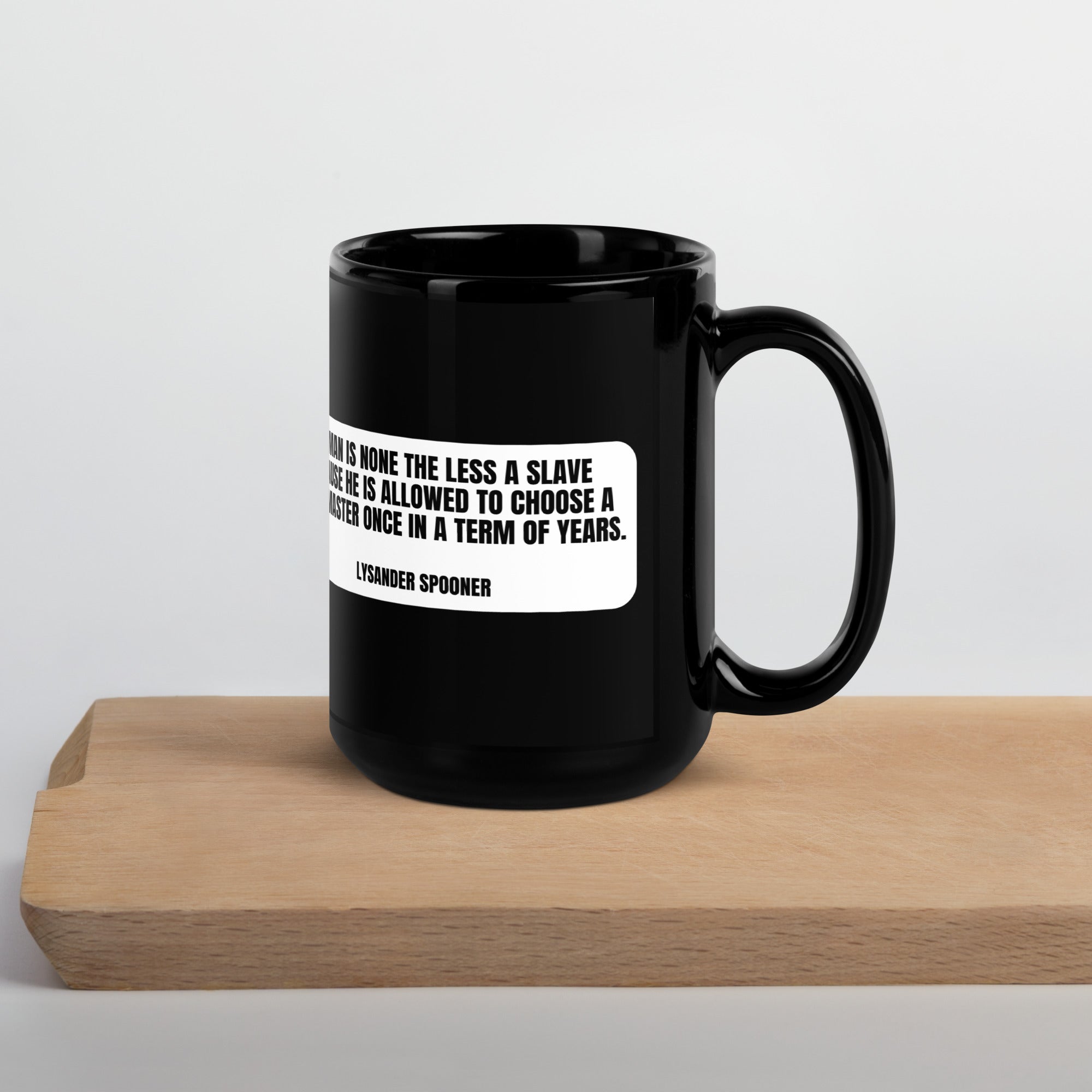 A man is none the less a slave... - Lysander Spooner Black Glossy Mug