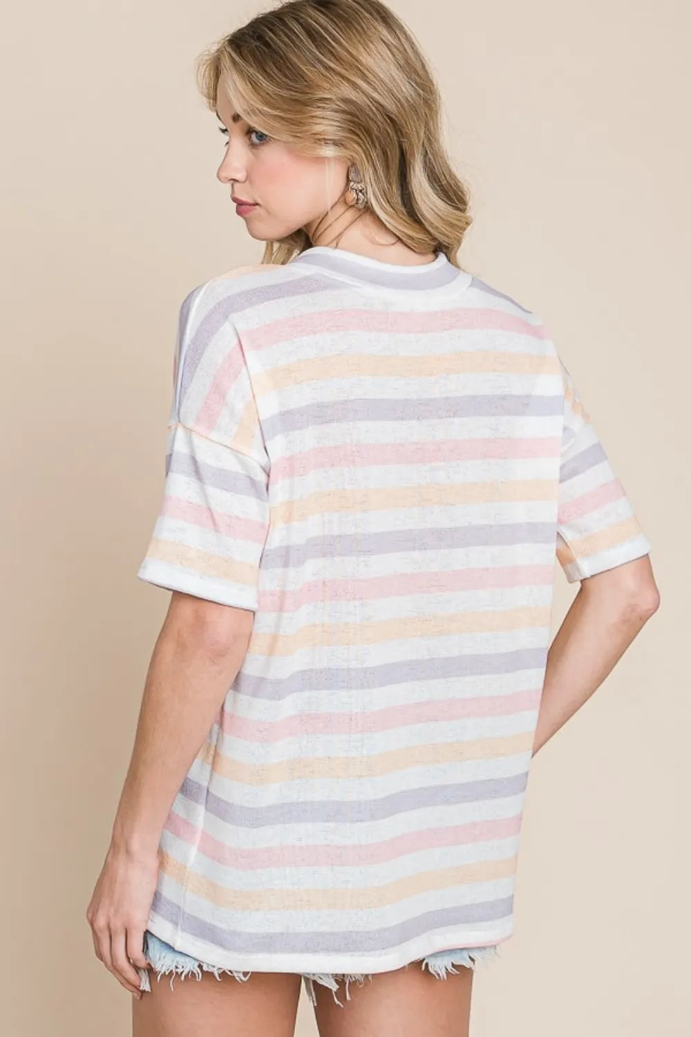 Back view of striped V‑neck short sleeve T‑shirt showing fit and lengt
