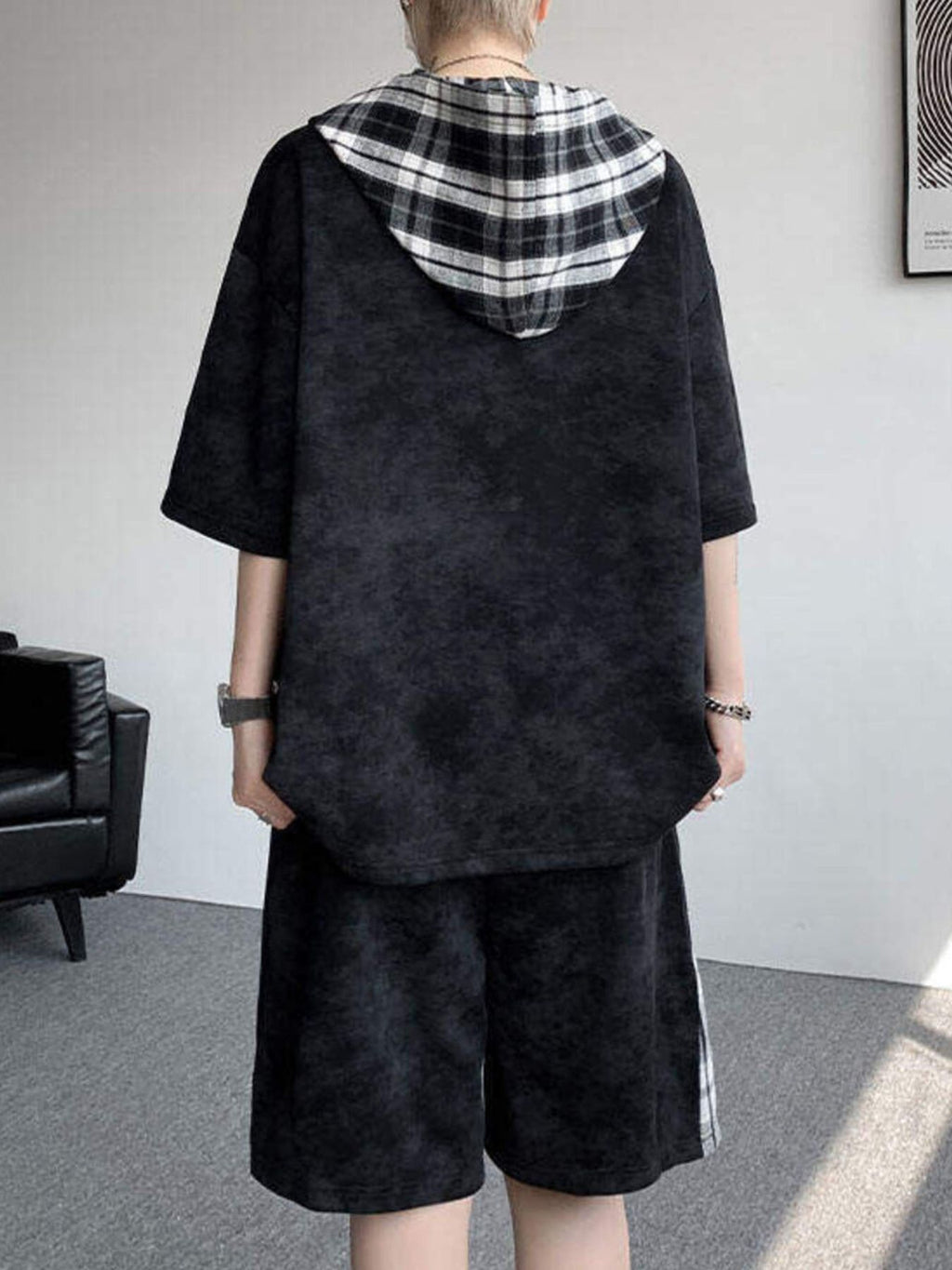 Men's Plus Size Tie-Dye Plaid Patchwork Hoodie and Shorts Set, showcasing the back view of the black outfit with plaid details.