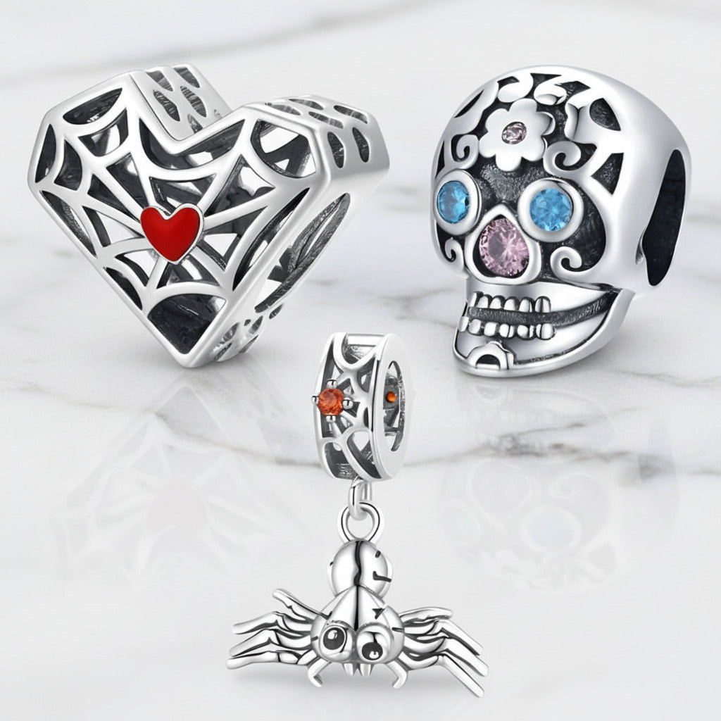 Gothic Hollow Skull and Cobweb Charms
